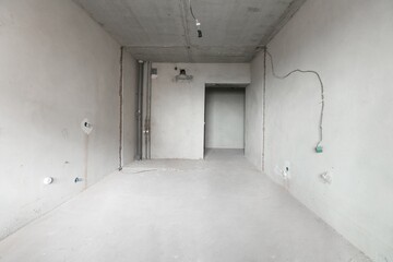 interior of the apartment without decoration in gray colors