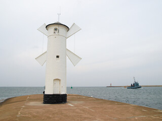 Stawa Młyny - windmill-shaped navigation sign, located at the end of the Breakwater in Świnoujście, Poland, Baltic Sea