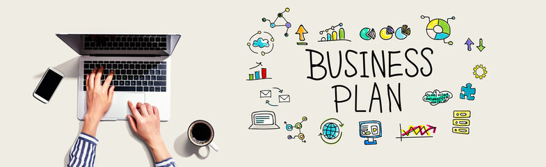 Obraz na płótnie Canvas Business plan with person using a laptop computer