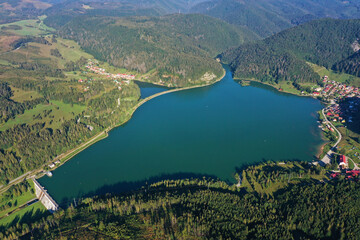 Naklejka na ściany i meble Aerial view of the Palcmanska Masa reservoir in the village of Dedinky in Slovakia