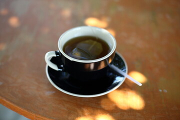 cup of tea on old wooden  table