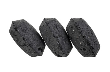 Coal briquette for BBQ isolated on a white background. Charcoal briquettes.