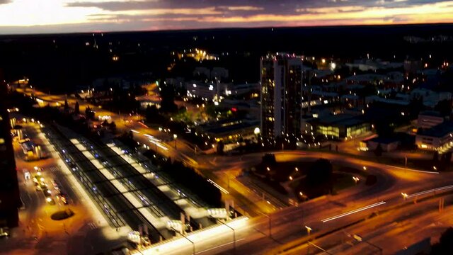 Long exposure hyper-lapse using a drone in Helsinki, Finland flying parallel to a highway during the sunset. Capturing the fast movement of cars and the changing colors of the sky and the city.