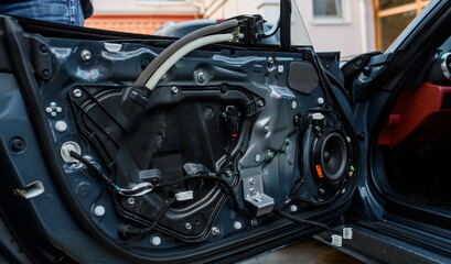 Fototapeta premium Interior part of a car door after restoration.