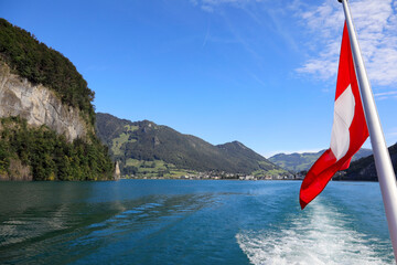 Picturesque landscape and the flag of Switzerland