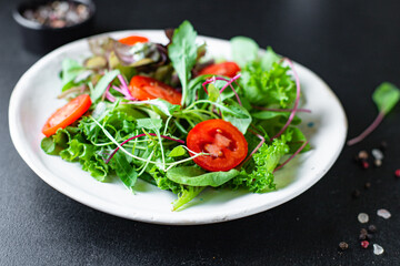 healthy salad lettuce and vegetables organic ingredients vitamins cook a snack meal on the table tasty serving size portion top view copy space for text food background rustic keto or paleo diet