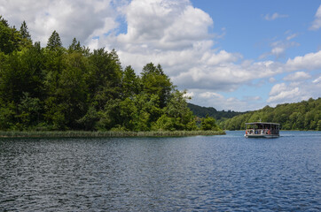 Fototapeta na wymiar Plitvice Lakes National Park in Croatia - Boat Ride in the Peaceful Beautiful Lake 