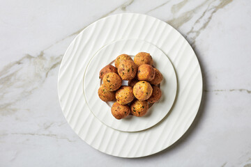Mediterranean deep-fried falafels on a black plate
