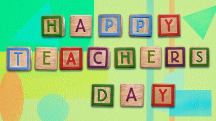 happy teacher’s  day greeting card. by wooden  cubes on abstract  background.