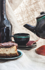 autumn atmosphere tea and coffee with a delicious cake on a wooden background