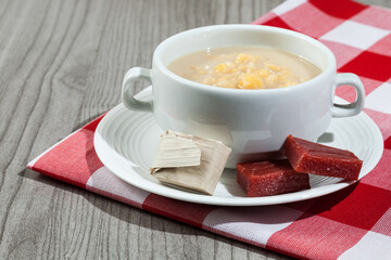 Food Antioquia / Colombia; Mazamorra made with corn served with sweet guava.