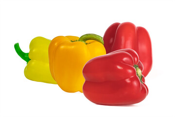 red and yellow juicy sweet peppers isolated on a white background