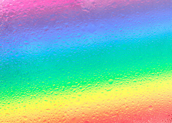 abstract colorful background with splashes

Beautiful, abstract colorful background (texture) with splashes with rainbow colors, top view close-up.