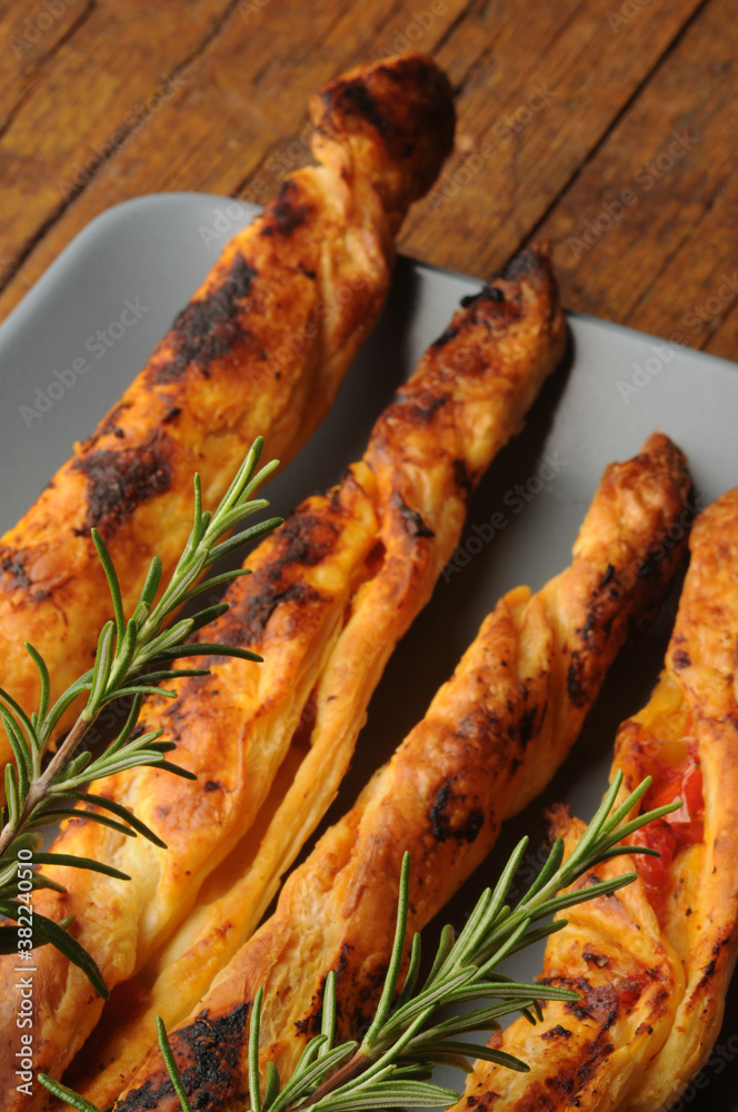 Canvas Prints Grissini di pasta sfoglia ripieni ft0210_1043 Homemade puff pastry breadsticks.