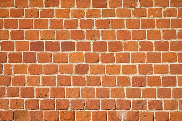Red brick wall. Background of a old brick house. The ancient masonry, brickwork.