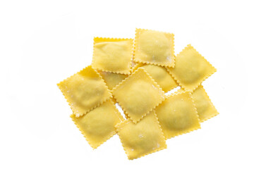Fresh Ravioli pasta golden color isolated on white background, top view