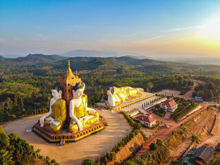 Aerial by drone of the huge sitting and reclining Buddhas, Ko Yin Lay, Pupawadoy Monastery near Ye, Mon state