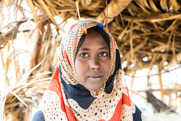 Portrait of woman wearing Muslim traditional Hijab, Melabday, Asso Bhole, Danakil Depression, Afar Region, Ethiopia