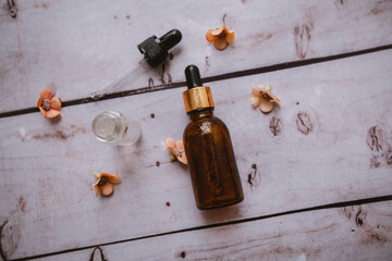 
bottles and pipettes with hyaluronic serum for cosmetic and beauty treatments