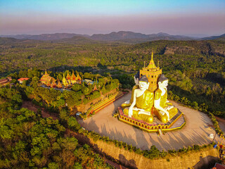 Aerial by drone of the huge sitting Buddhas, Ko Yin Lay, Pupawadoy Monastery near Ye, Mon state