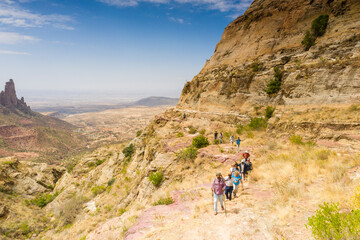 Ethiopian guides with tourists hiking to Gheralta Mountains, Tigray Region, Ethiopia