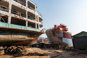 Ships being broken up in the shipwreck cemetery (ship breaking yard), Port of Dhaka