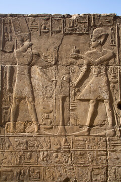 Pharaoh on right, God Amun on the left, Bas Relief, Luxor Temple, Luxor, Thebes