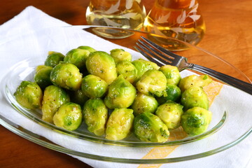 Roasted Brussels Sprouts in a White Plate  