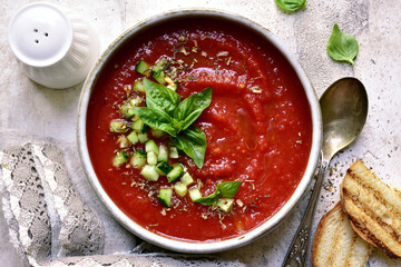 Gazpacho - traditional spanish cold tomato soup. Top view with copy space.