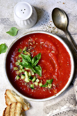 Gazpacho - traditional spanish cold tomato soup. Top view with copy space.