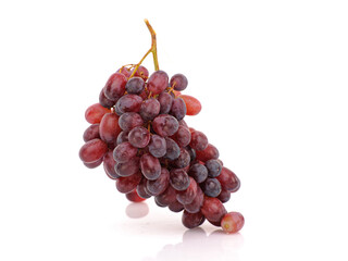 Bunch of Grapes on white reflective background. Isolated