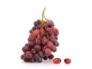 Obraz premium Bunch of Grapes on white reflective background. Isolated