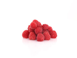 Fresh Raspberries on white reflective background. Isolated