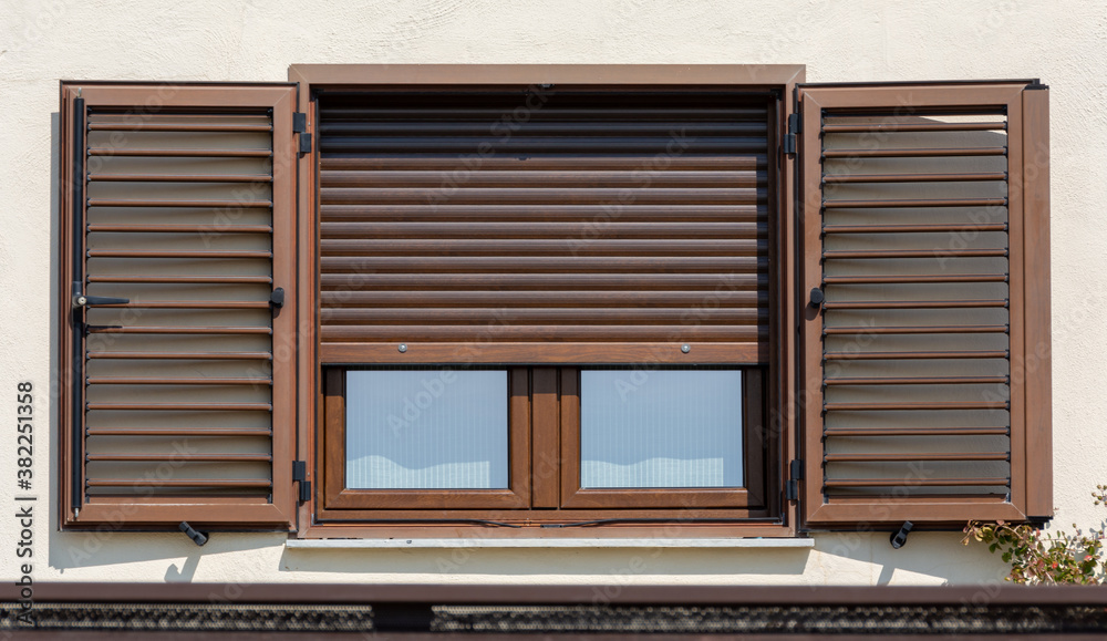 Wall mural wooden window with open shutters