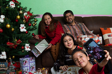 Family taking a selfie in Christmas