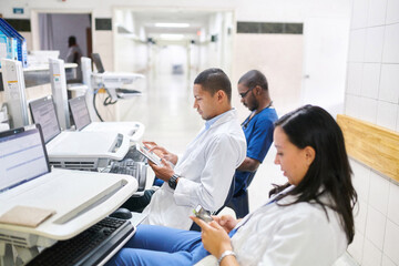Concentrated doctors working doing office work
