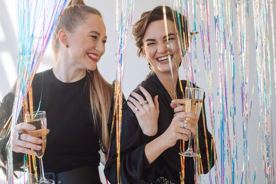 Happy friends having fun during party