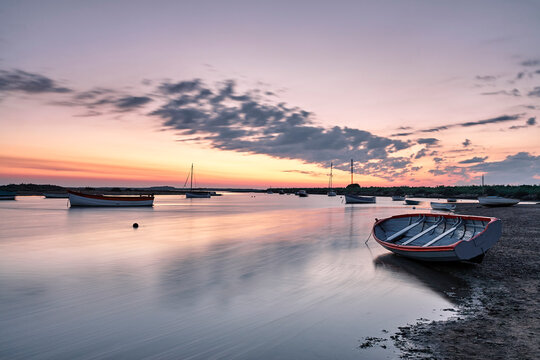 Boats at dawn. Burnham Overy Staithe, Norfolk, UK.