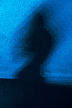 Prismatic Abstract Buddha glitch background with some intentional blur motion