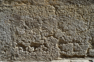the texture of the old wall from stones as background