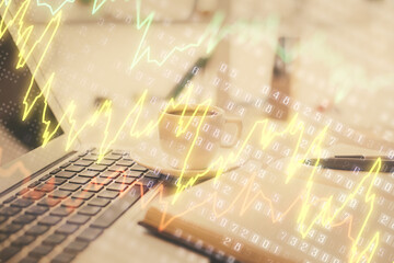 Double exposure of financial chart drawing and desktop with coffee and items on table background. Concept of forex market trading