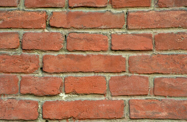 the texture of the old wall from red bricks as background