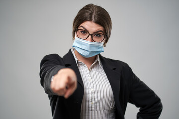 Fototapeta na wymiar Businesswoman with protective face mask