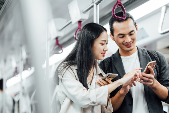 Business people traveling together in subway