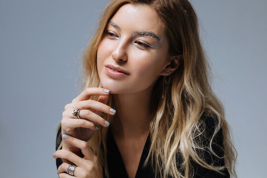 Smiling stylish blond woman
