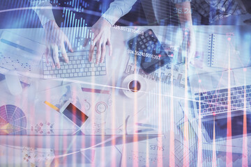 Double exposure of man and woman working together and financial chart hologram drawing. market analysis concept. Computer background. Top View.