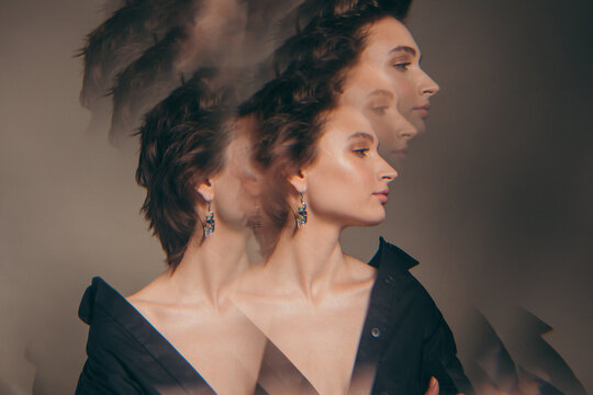 Double exposure portrait of brunette in black