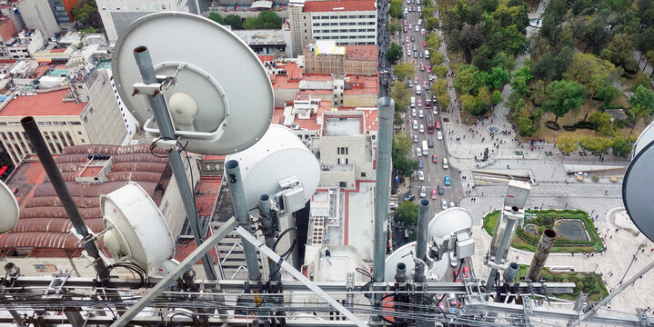 Telecom and broadcasting antennas on a tower, serving a big city