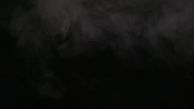 Grey gray steam, vapor on a black background, mistic spooky intro