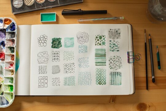 Flat lay of artist's table